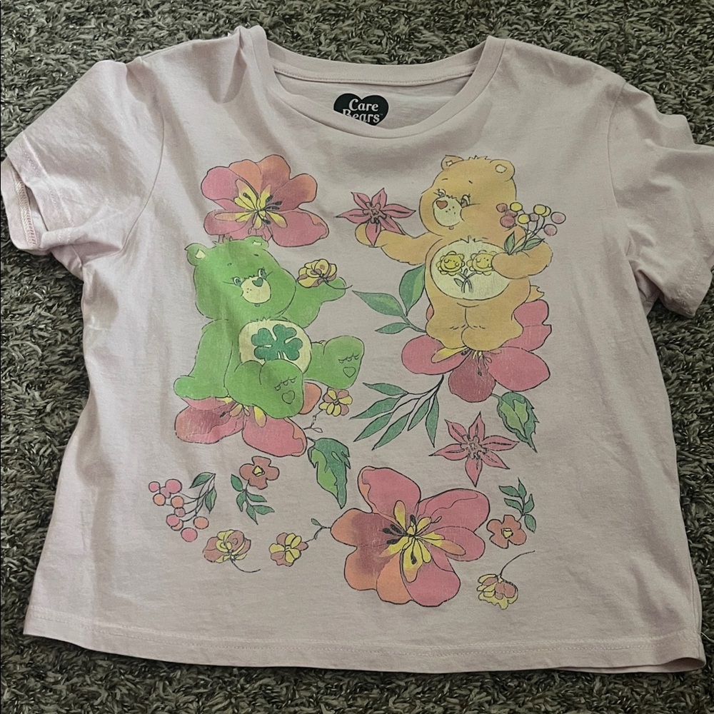 Care Bears Pastel Pink Floral Graphic Tee with Green & Yellow Bears